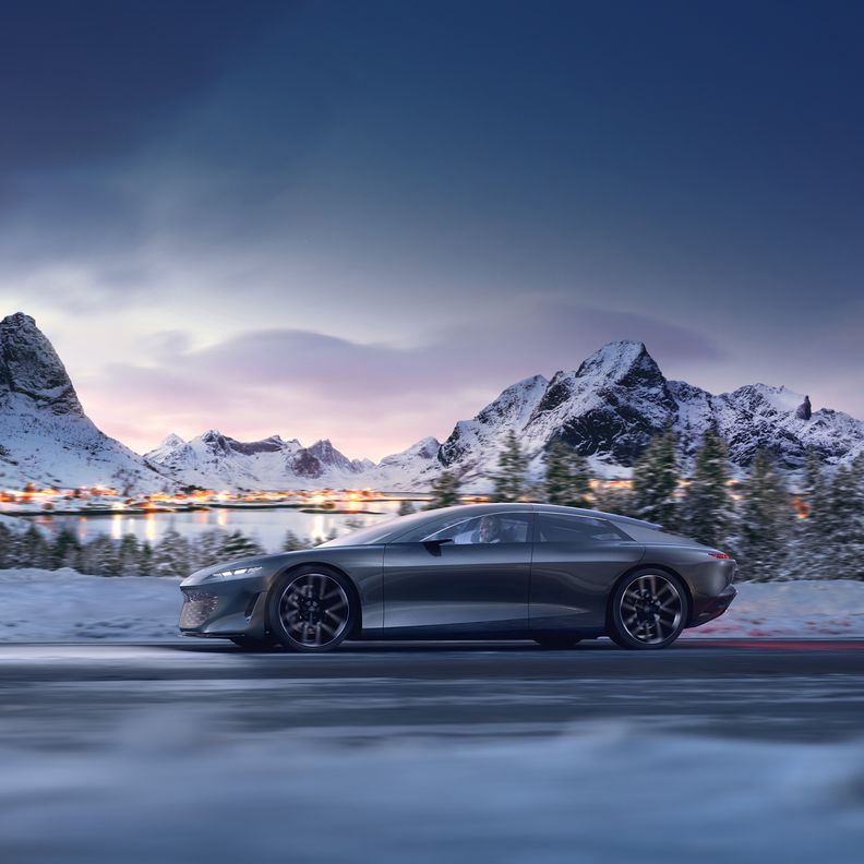 The  Audi grandsphere concept driving on a snowy road.
