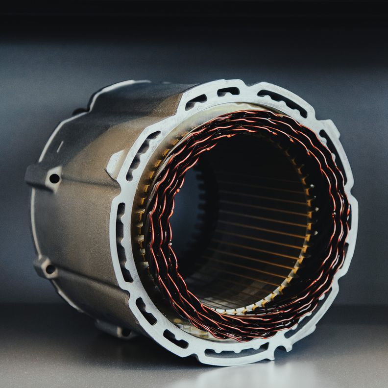 Close-up of an electric motor’s stator housing.