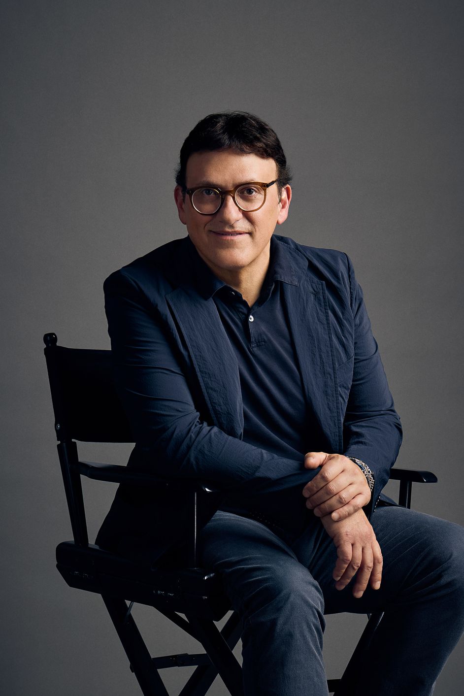 A portrait of Anthony Russo sitting in his director’s chair.