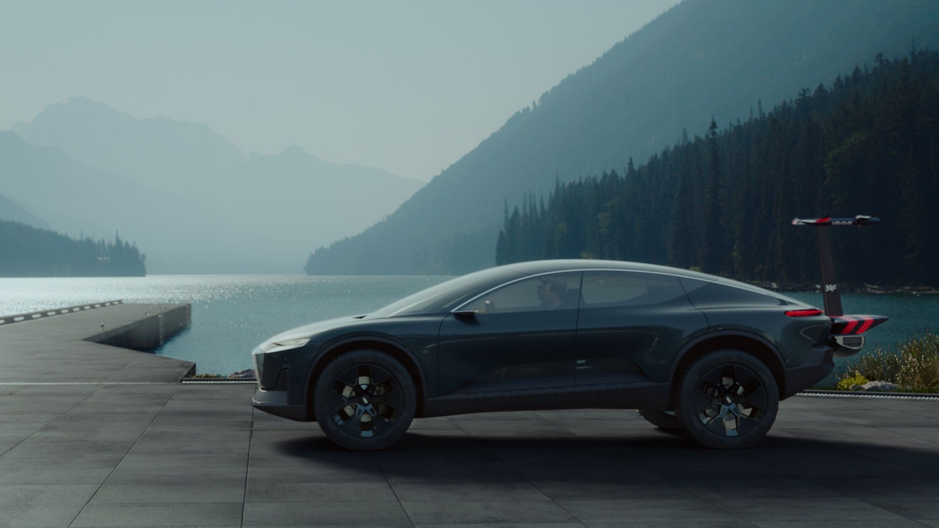 The Audi activesphere concept in front of a lake landscape.